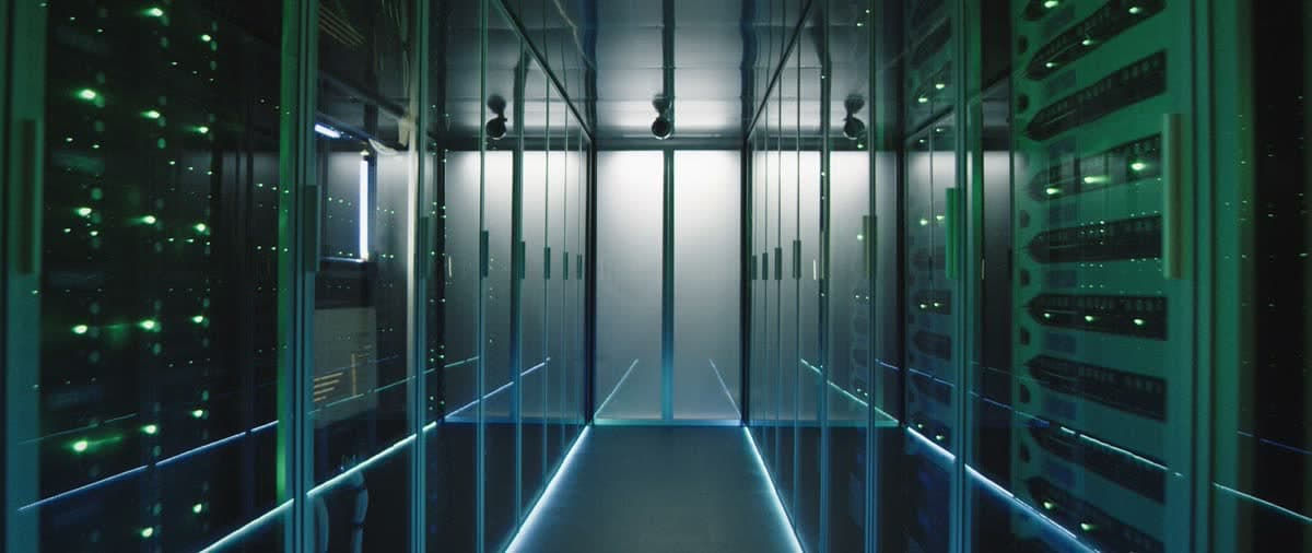 A data center corridor lined with server racks